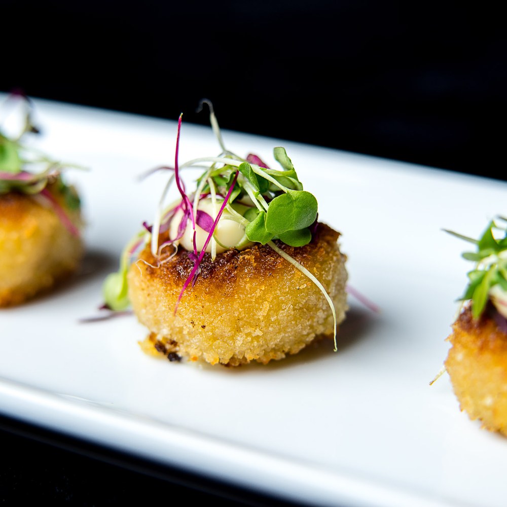 Jumbo lump crab cake with microgreens