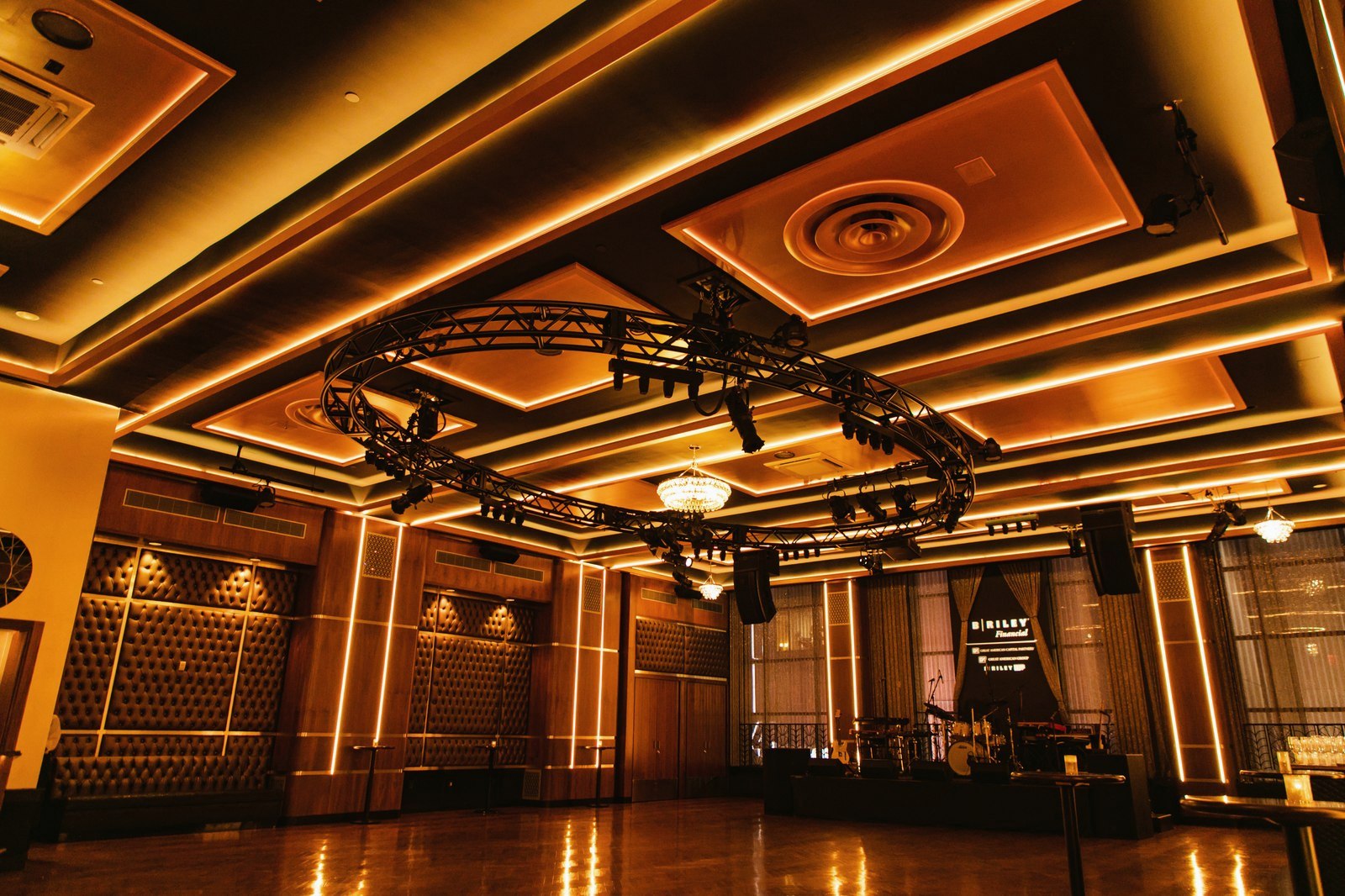 The South Ballroom in warm gold light, set for an evening event